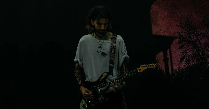 A street musician passionately playing electric guitar in Istanbul